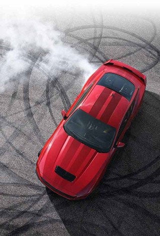 Overhead view of a 2024 Ford Mustang® model with tire tracks on pavement | White's Canyon Ford in Spearfish SD