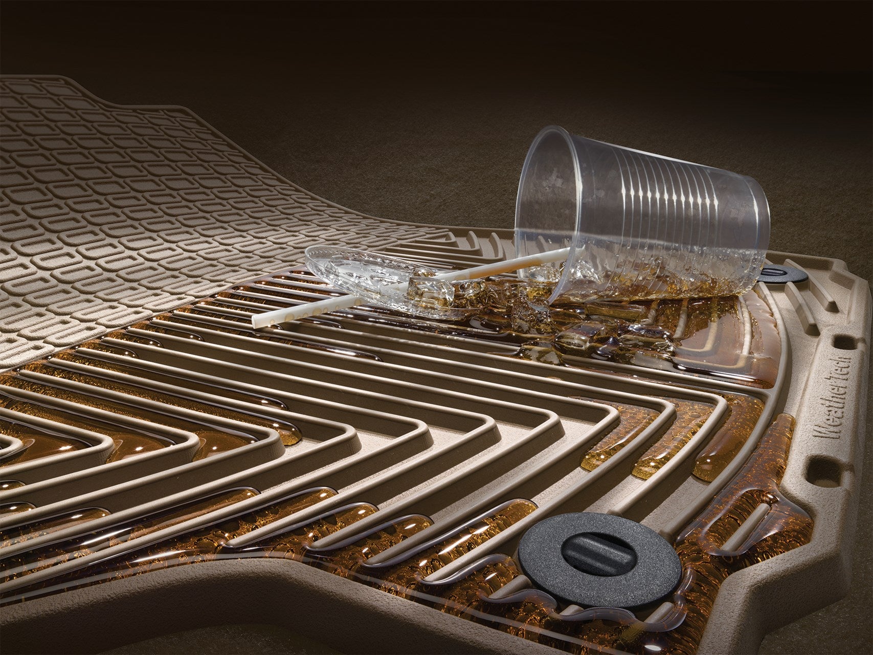 Brown floor liner with a spilled over cup